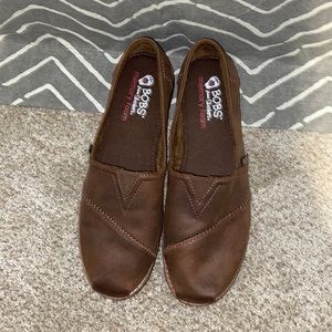 Brown leather bobs